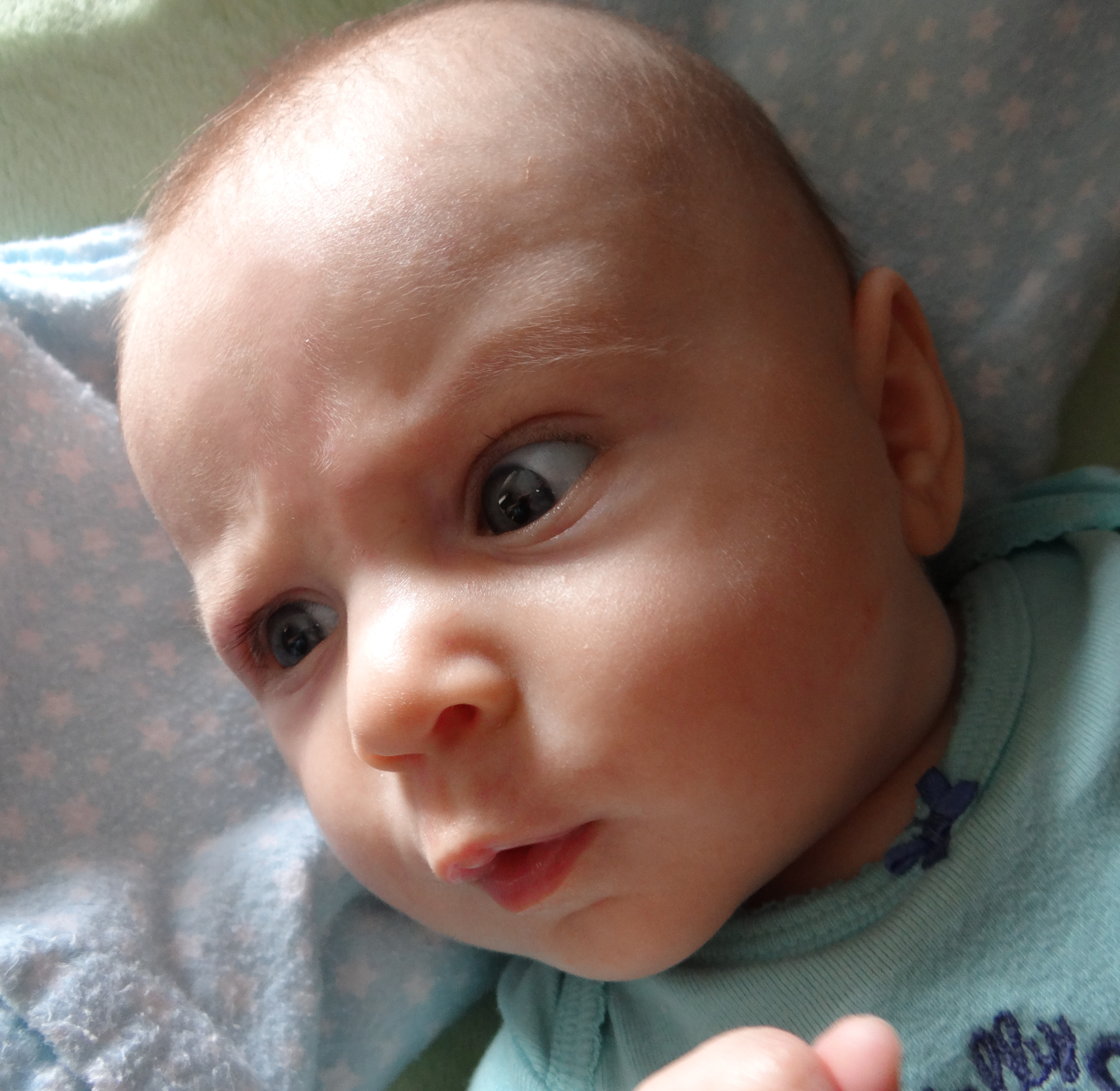 Baby with a quizzical facial expression