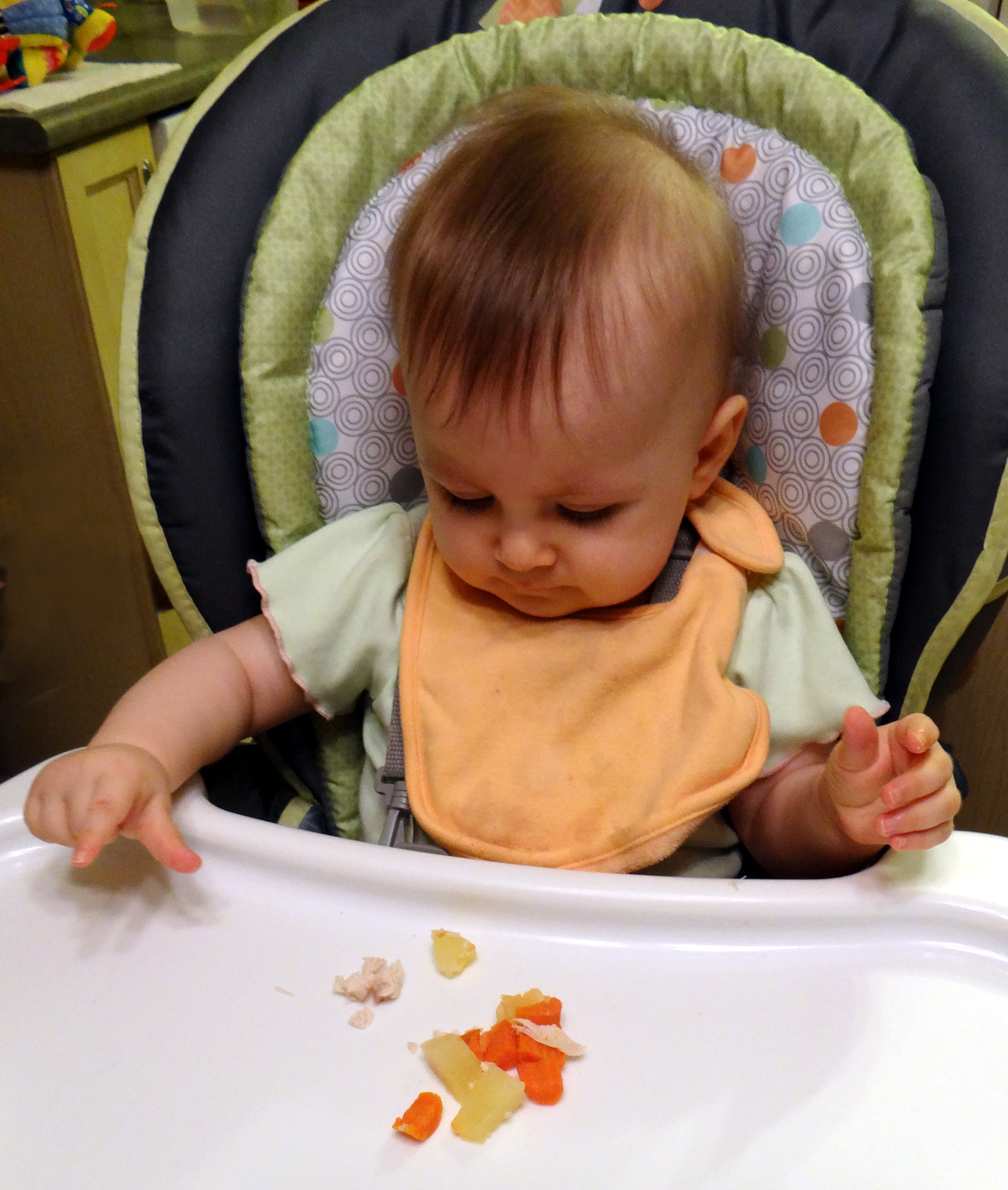 Baby self feeding with the pincer grasp