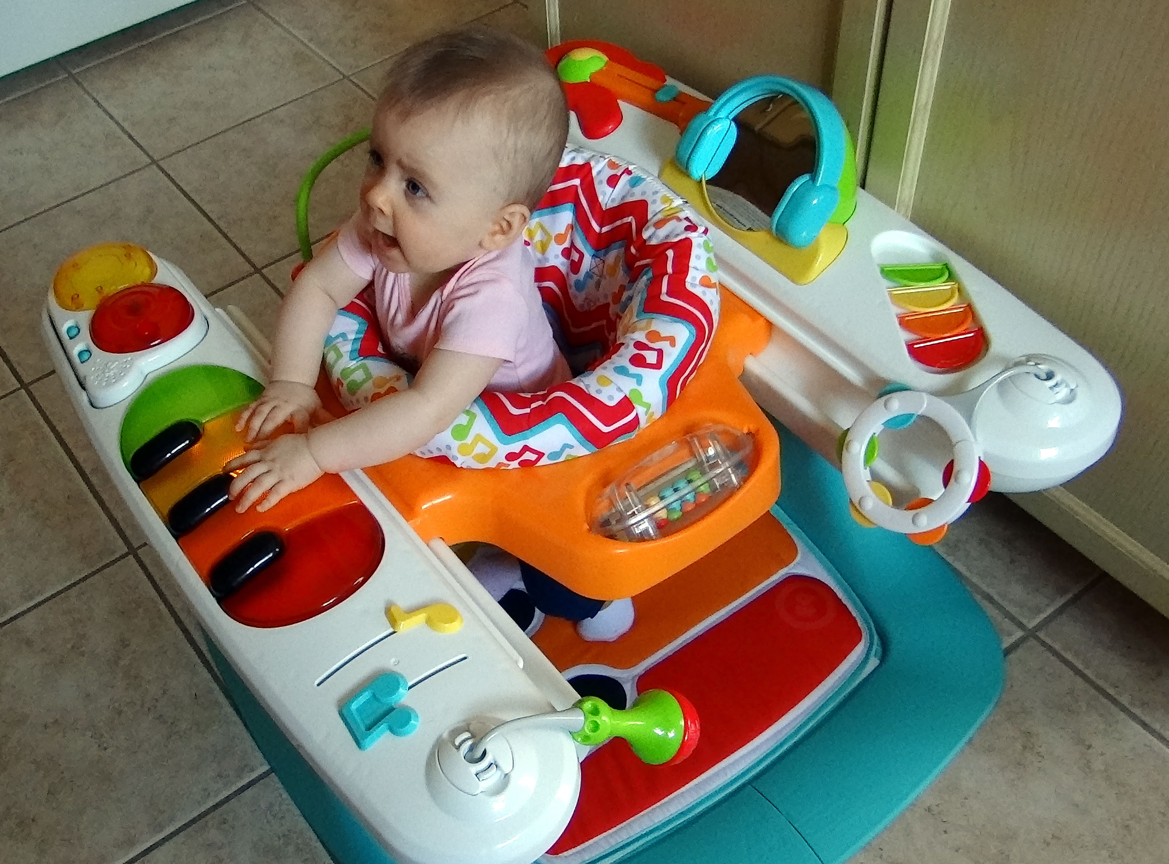 baby using the fisher-price 4-in-1 Step 'n Play Piano