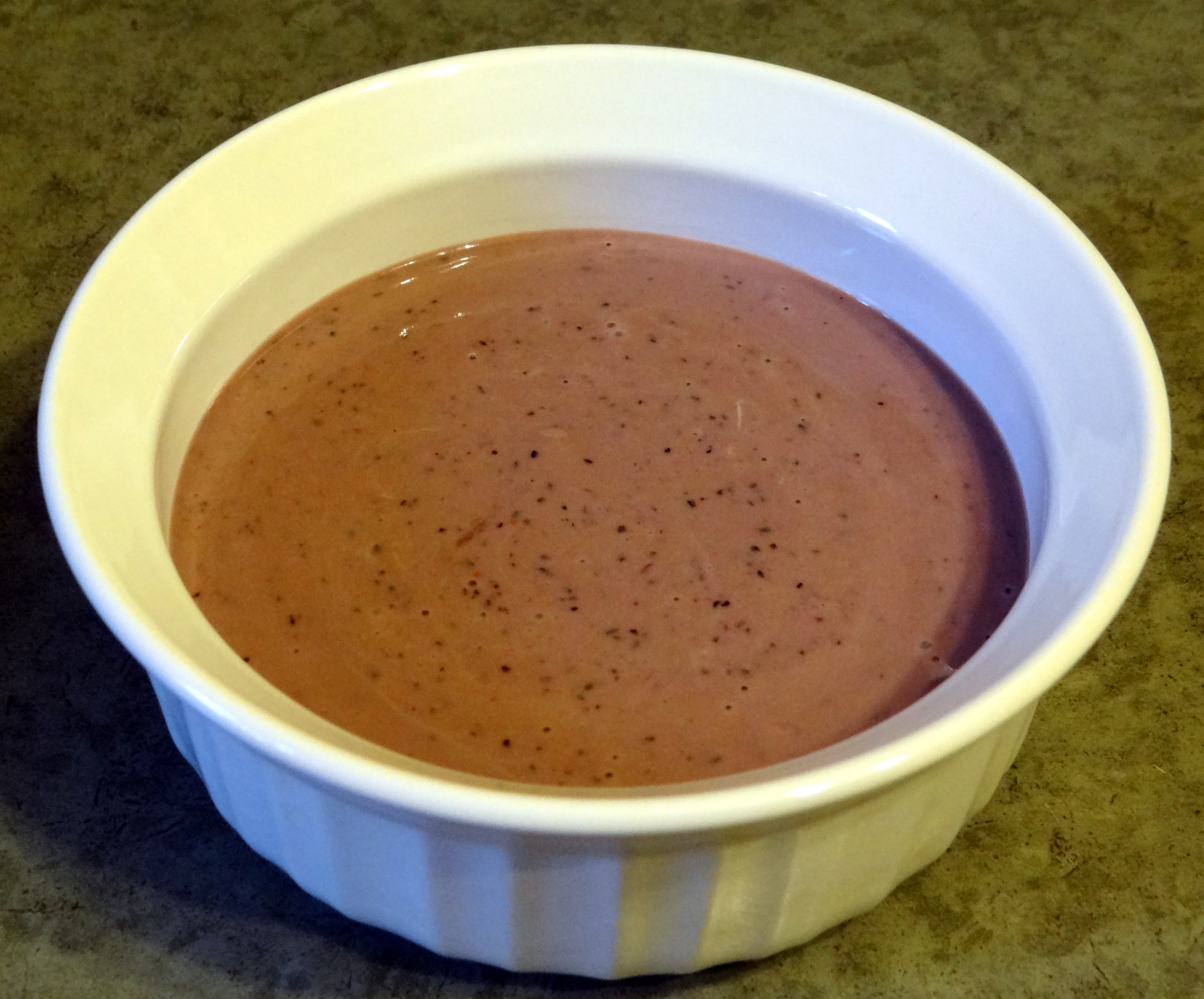 Organic baby food made with raspberry, blueberry, banana, and Greek Yogurt