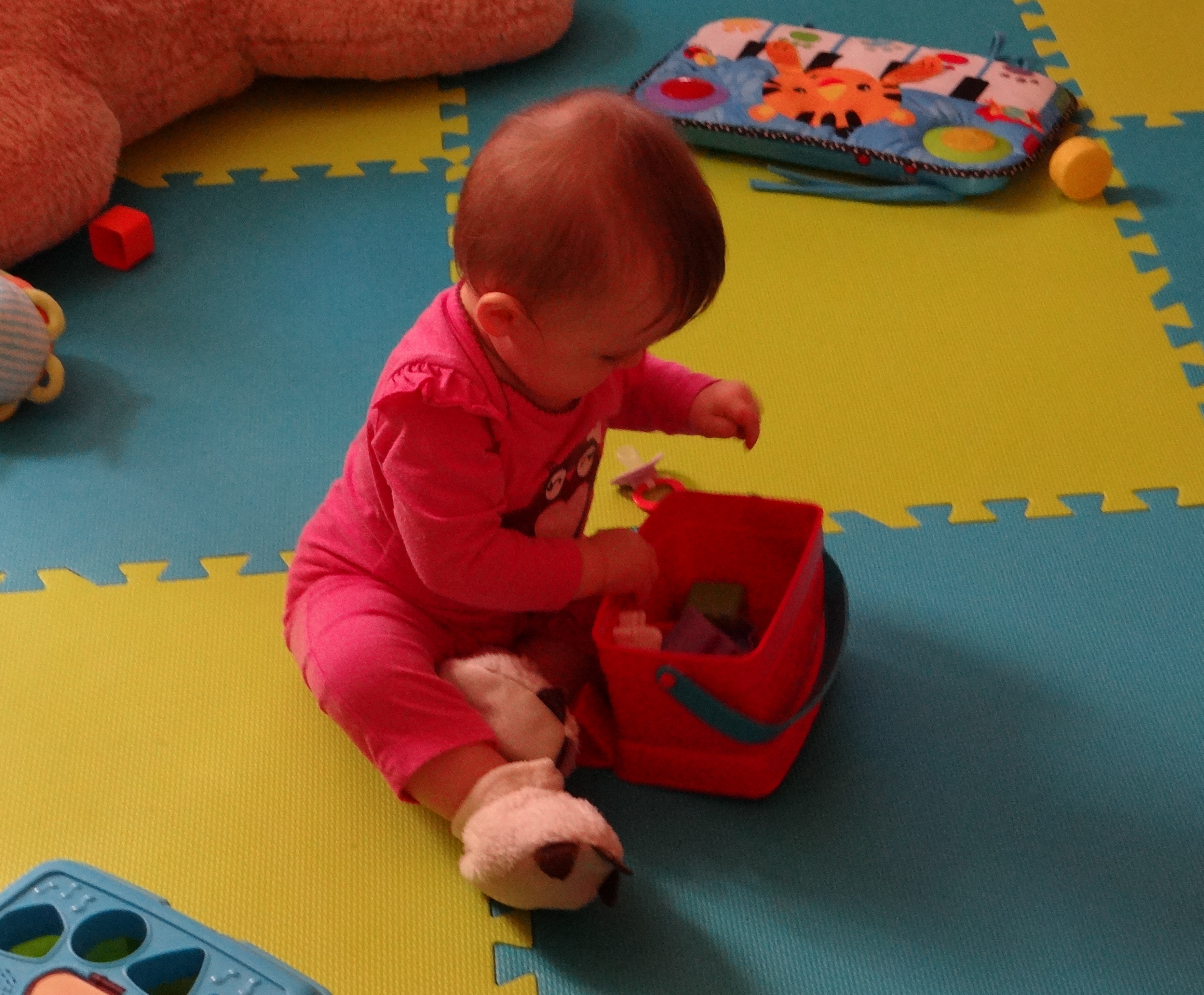Baby playing in a baby proof area